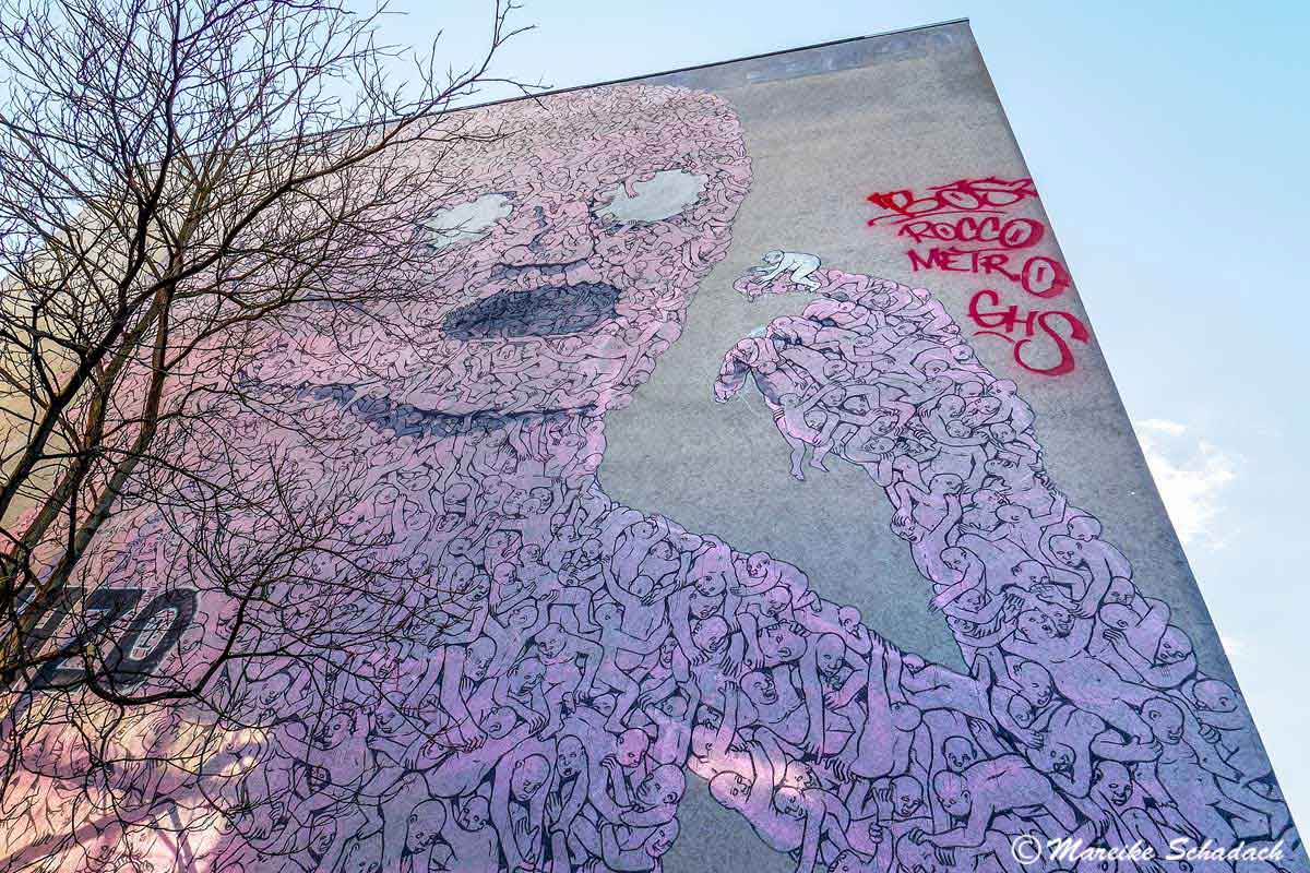 Mural von BLU: The Pink Man - Street Art Map Berlin